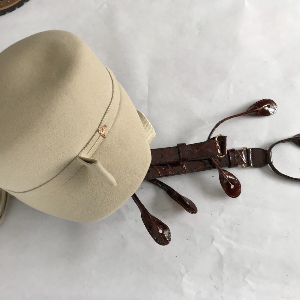 Designer hat and leather suspenders